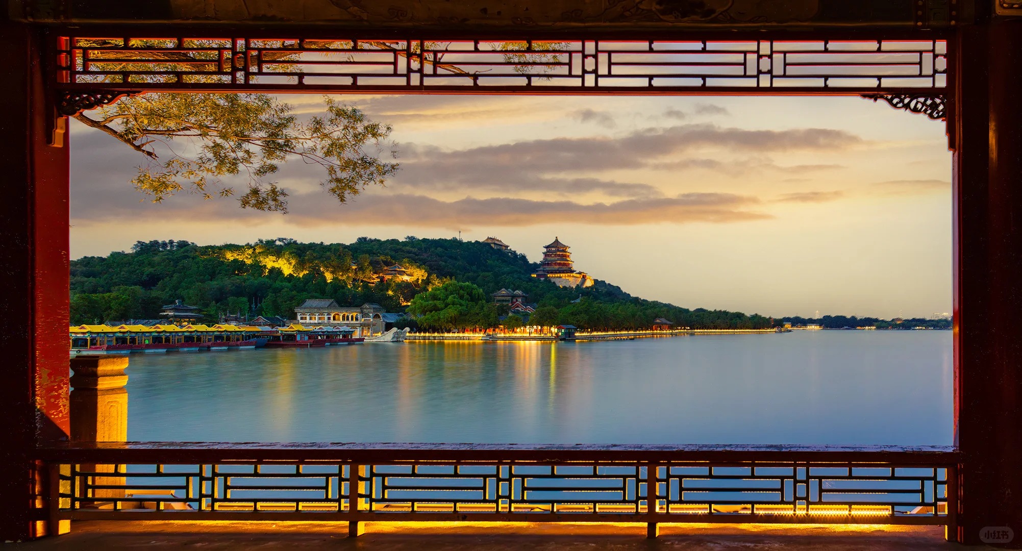  Kunming Lake and Longevity Hill at the Summer Palace framed by a pavilion at evening.