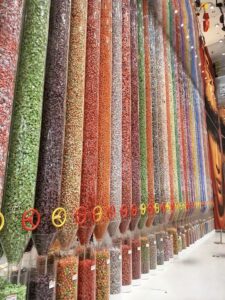 Tall transparent tubes filled with candies in many bright colors at Changsha Snack Kingdom.