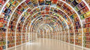 A brightly lit arched tunnel lined from floor to ceiling with packaged snacks at Changsha Snack Kingdom.