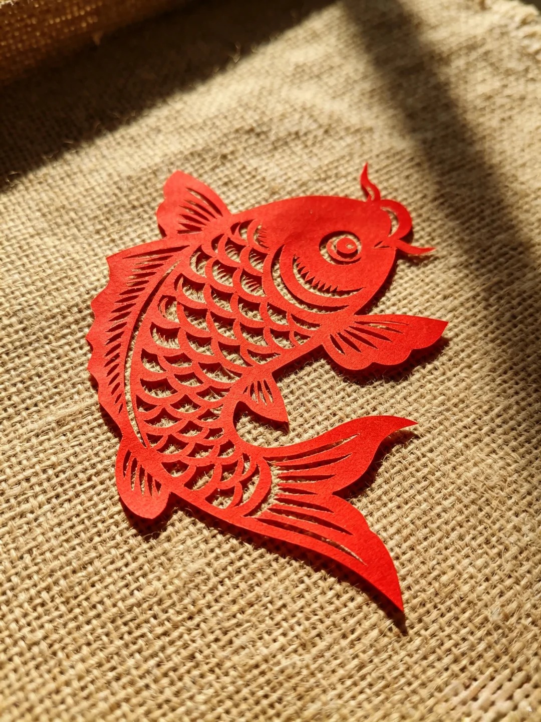Shanxi paper-cutting transforms a single sheet into a lively symbol of folk culture.