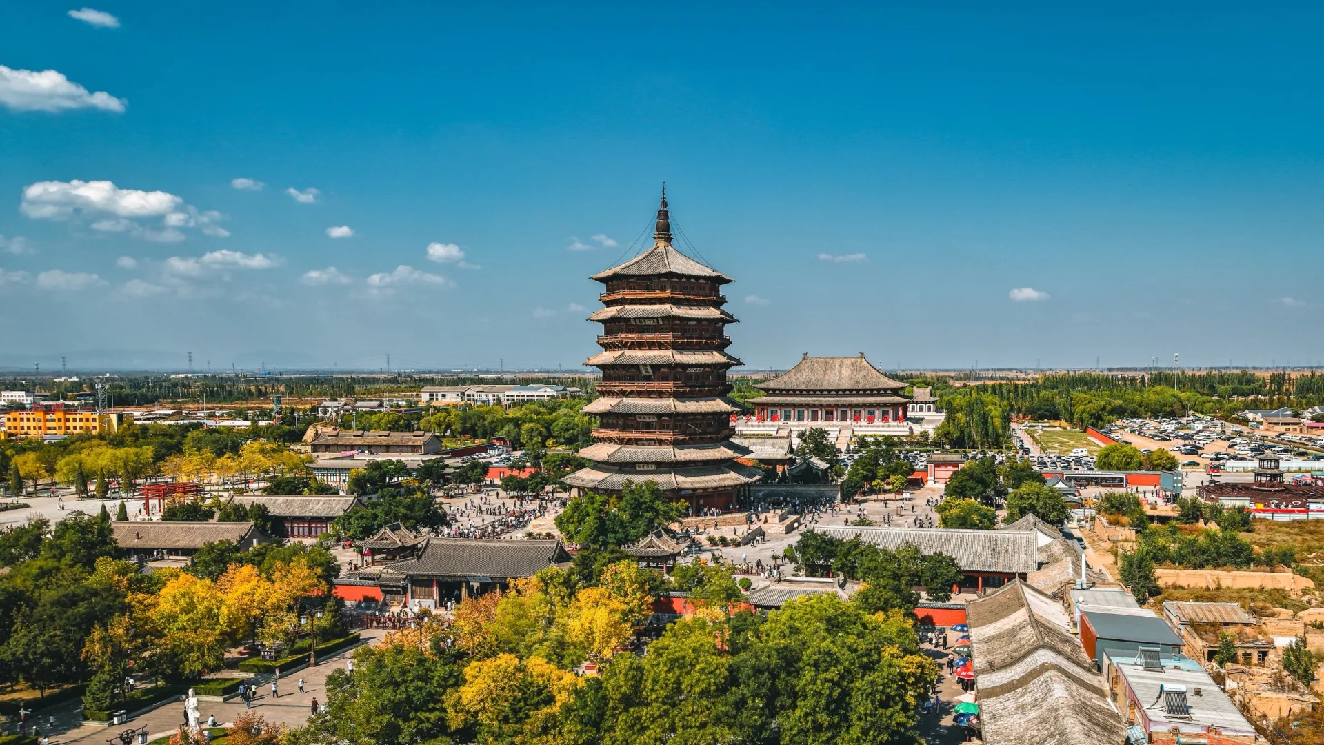 The Yingxian Wooden Pagoda rises above the surrounding town and fields.